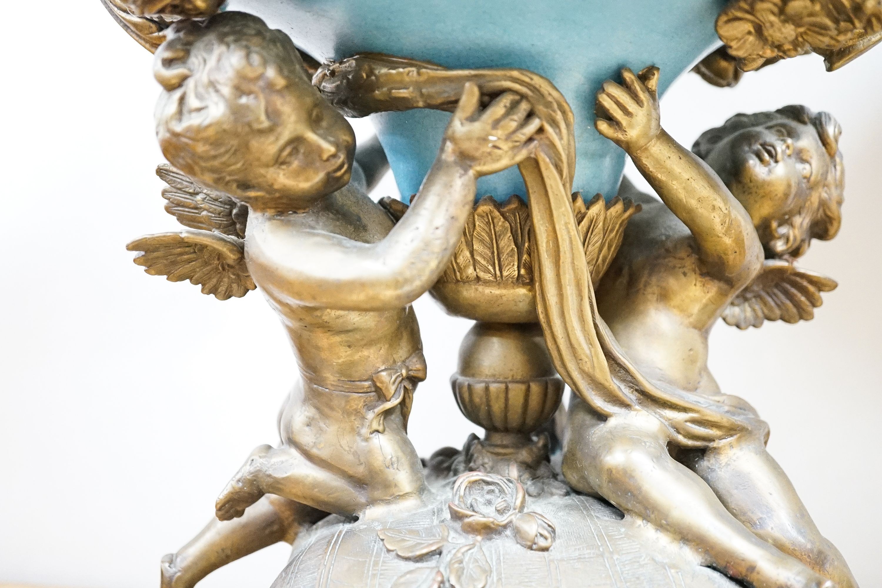 A pair of large ormolu mounted earthenware vases 39cm